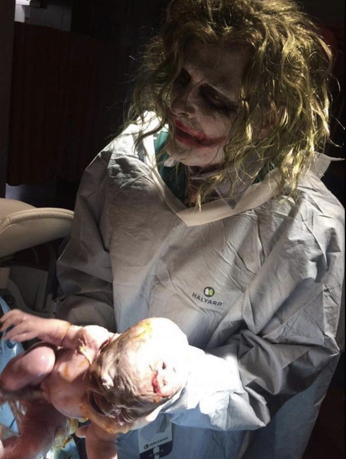 doctor delivering baby dressed as joker - Chalyard Halyard